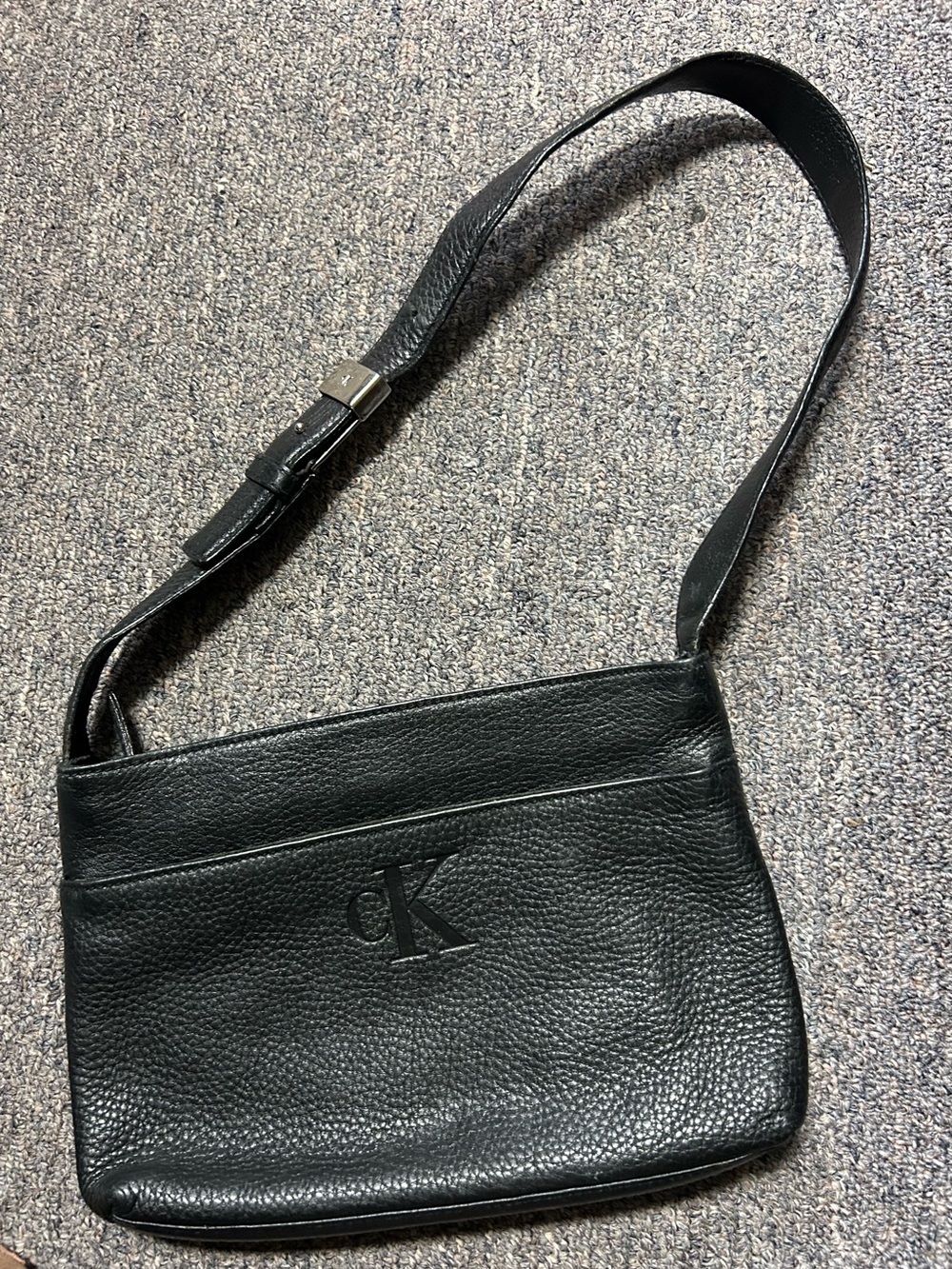 Calvin Klein Black Pebbled Leather Shoulder Bag with Embossed CK